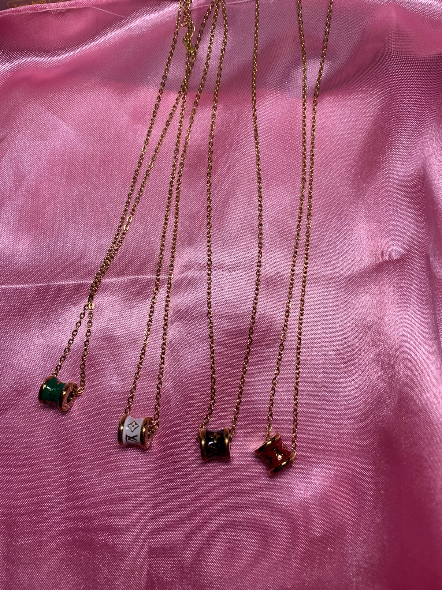 LV wheel necklace